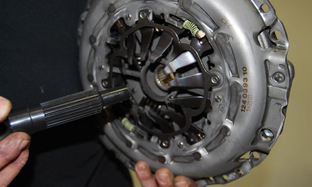 assembly. Insert tool into the splines of the clutch disc as shown.