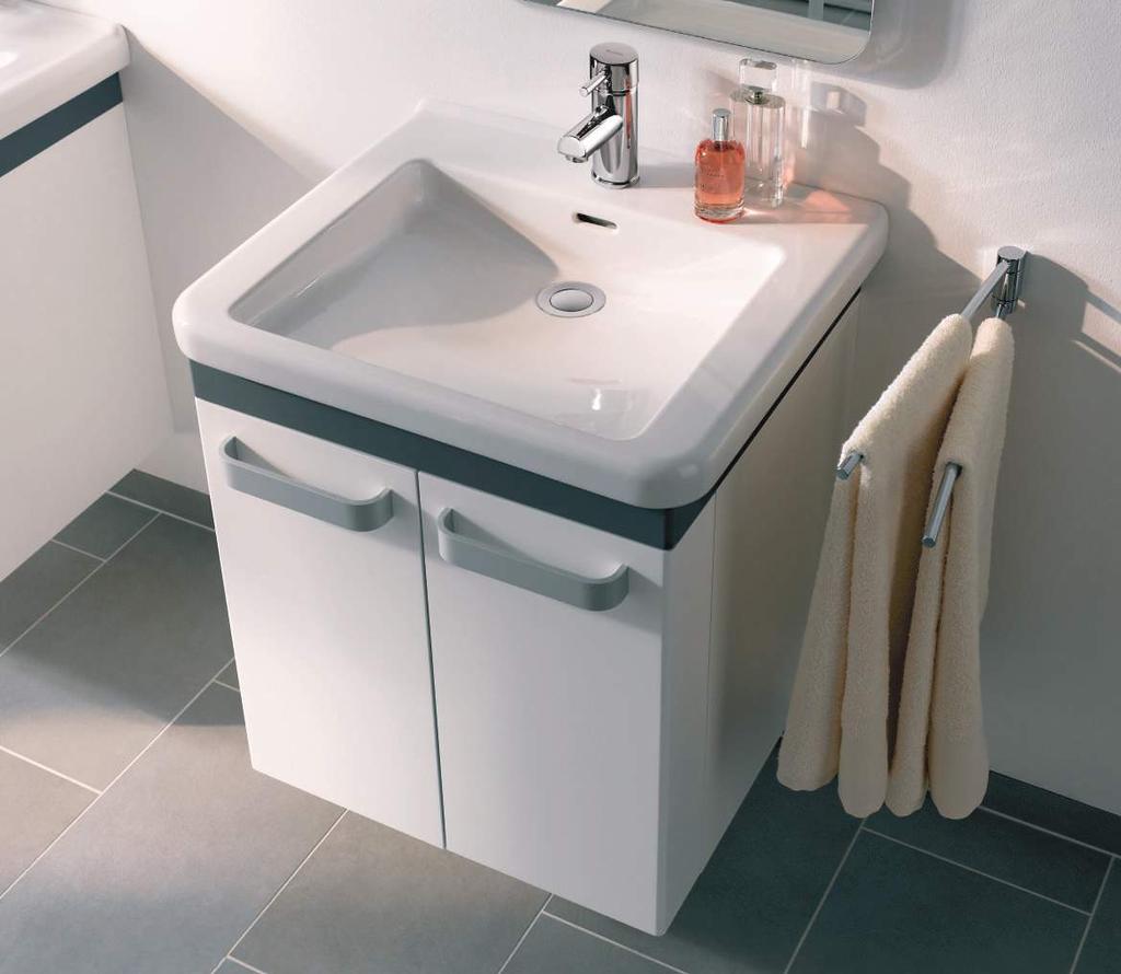 The underbasin furniture unit doors feature clever shelves where products can be easily stored and