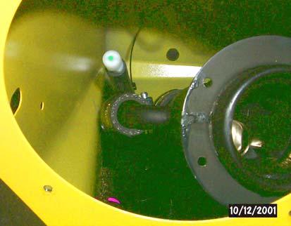 f. Install fuel filler assembly on fuel tank with two clamps. Vent & Fuel Filler Hoses Clamps g.
