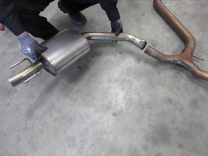 Place a clamp over the expanded end of the L/H Muffler Assembly and slide into the OEM Y-pipe Assembly. (See Fig. 10) 4.
