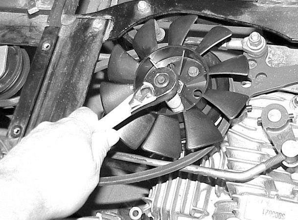 8. Install the drive belt around the transaxle pulley and also install the transaxle cooling fan with the 3 retaining screws (Figure 81). 10.