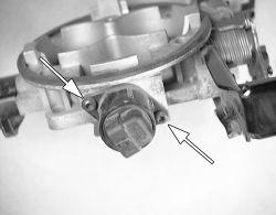 The IAC motor is located on the rear of the throttle body secured by two Torx screws. 1. Disconnect the negative battery cable. 2. Remove the air cleaner assembly. 3. Unplug the IAC motor connector.