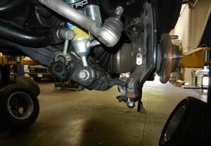 (Fig 9) Install the upper ball joint to the knuckle using the supplied ball joint nut. Torque to 85 ft-lbs.