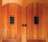 Signature Carriage Wood doors combine the classic swing-open appearance and detailing of carriage house wood doors with the convenience of sectional garage doors.