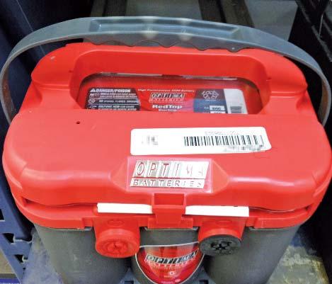 AGM batteries, like the one in Figure 19-15, contain the acid in the absorbent mat, eliminating acid leaks.