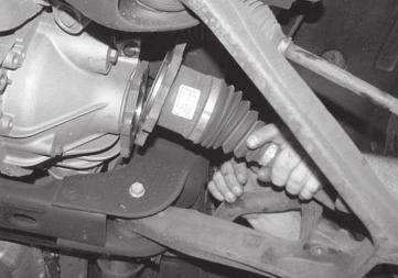 Follow the wheel speed sensor wire from frame rail plug. Separate the wire from the upper control arm.