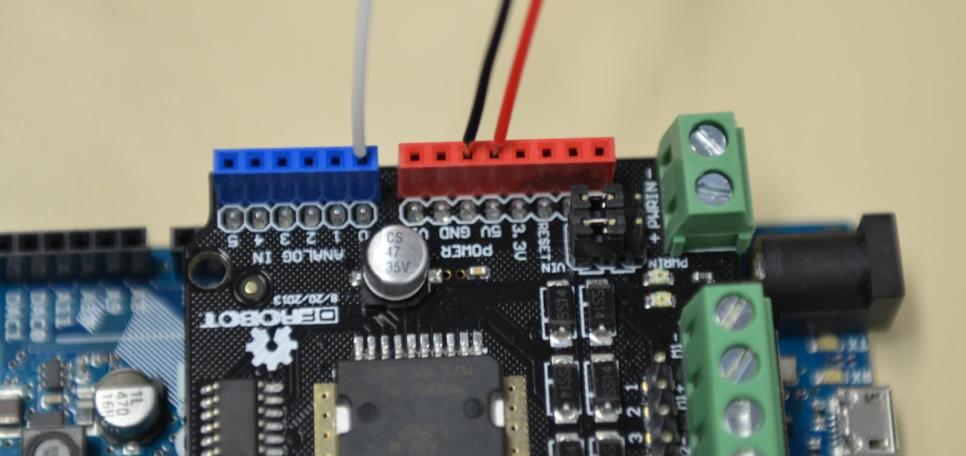 Shield as seen below. The sensor requires +5v (RED), GND (BLACK), and the analog sensor output (WHITE).