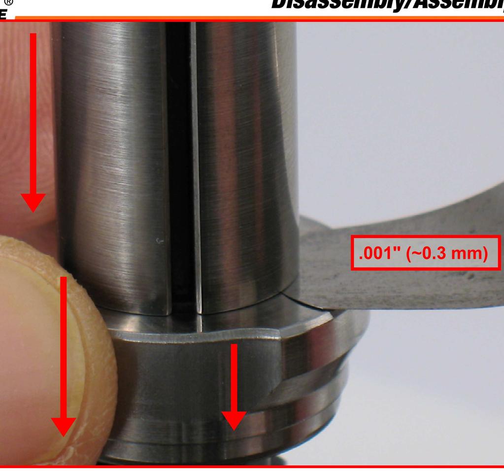 Use a3 mm) thick feeler gauge to check clearance between the front bearing plate and the