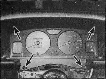 Carefully release the six retaining clips situated around the outside of the cover, then separate the cover and instrument panel