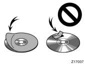 Correct Wrong Low quality discs Labeled discs Handle compact discs carefully, especially when you are inserting them. Hold them on the edge and do not bend them.