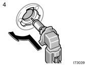 Install a new bulb base by turning it clockwise to the front of the vehicle.