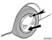 Lowering your vehicle Reinstalling wheel ornament (steel wheels only) 9. Lower the vehicle completely and tighten the wheel nuts. Turn the jack handle counterclockwise to lower the vehicle.