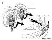 Low beam (outside) High beam (inside) Removing clip 1. Open the hood. Turn the bulb base counterclockwise to the front of the vehicle as shown.