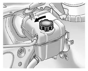 10-16 Vehicle Care 1. Remove the coolant surge tank pressure cap when the cooling system, including the coolant surge tank pressure cap and upper radiator hose, is no longer hot.