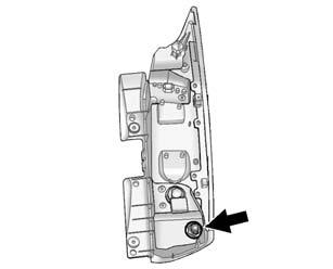 Vehicle Care 10-31 11. Push the push pin to secure the taillamp cover. License Plate Lamp To replace one of these bulbs: 1. Open the liftgate. See Liftgate on page 2-14. 4.