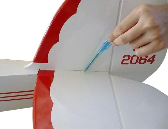 WWW.SEAGULLMODELS.COM 3) Slide the stabilizer into place in the precut slot in the rear of the fuselage. The stabilizer should be pushed firmly against the front of the slot.