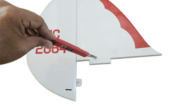 3) While holding the vertical stabilizer firmly in place, use a pen and draw a line on eachside of