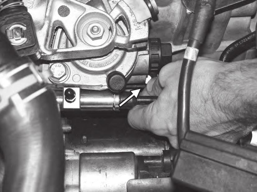 19) Pull the shift locking pin away from the shift selector.