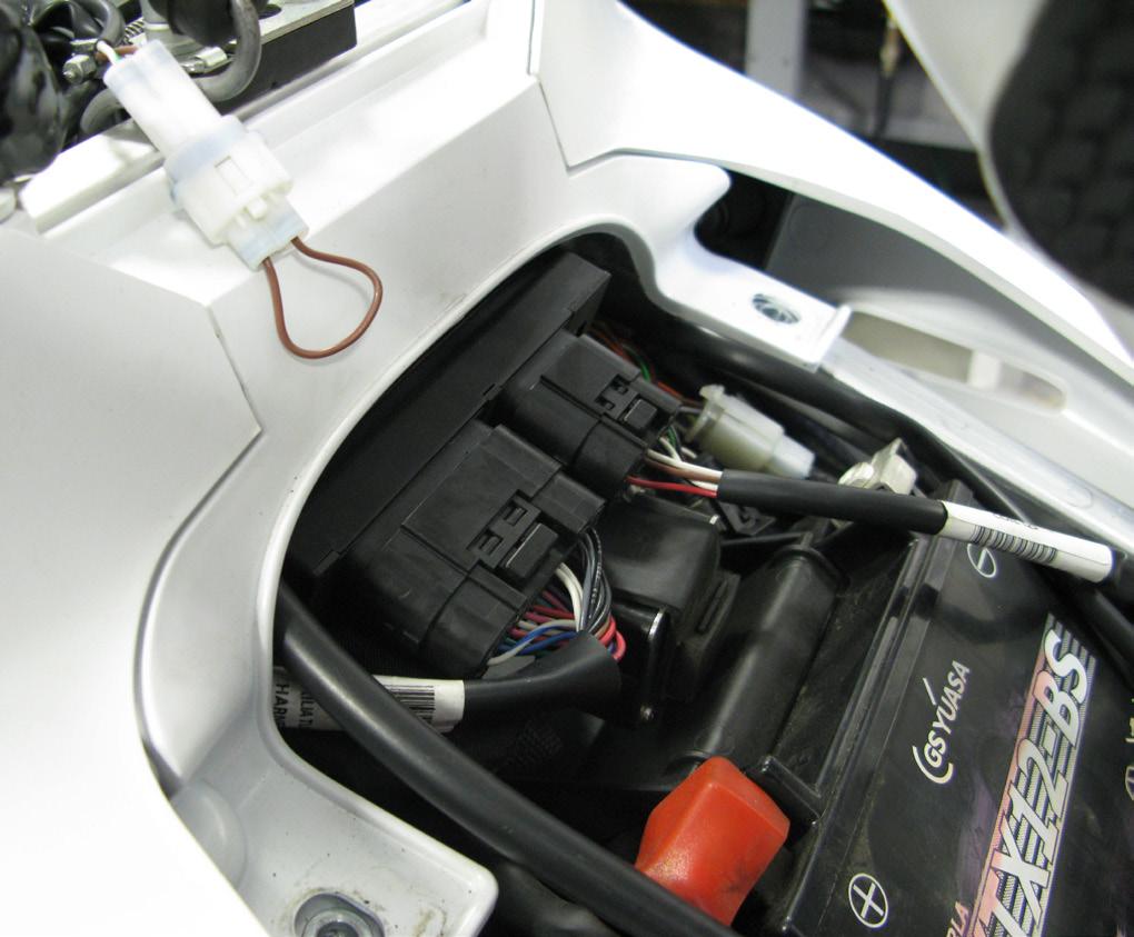 the passenger seat and connect it to the control module.