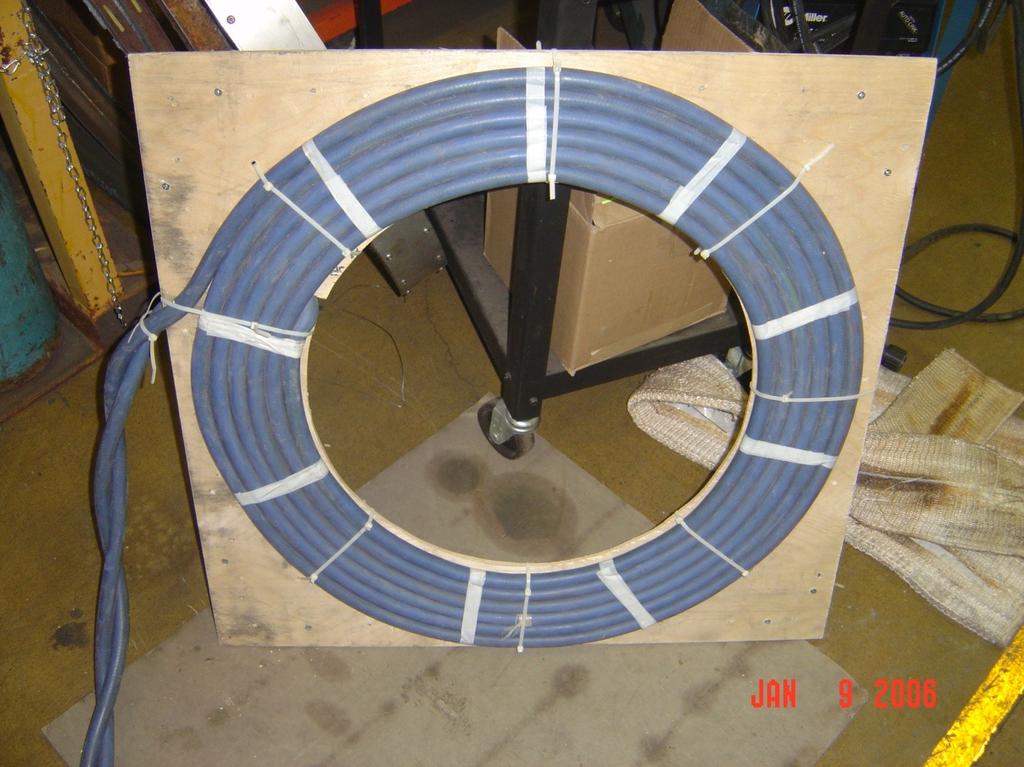 ProHeat 35 Fixture for Flat Plate This round, but flat pancake coil was created for a