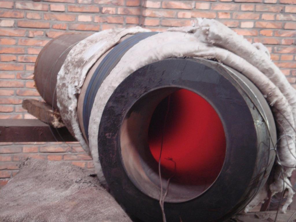 P92 PWHT 20 Inch Diameter 90 mm Wall A heavy wall, P92 pipe section is being heated to 1400 F (760 C) in a