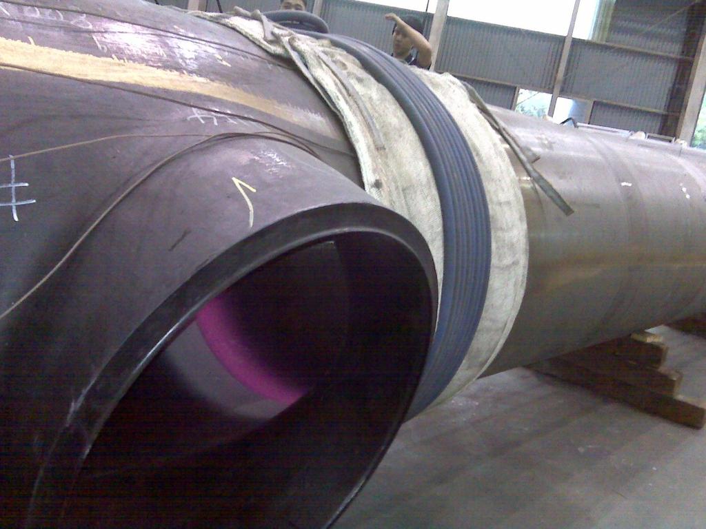 P91 PWHT A large diameter P91 pipe requires localized stress relief at the weld.