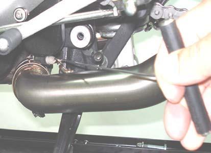Position the mufflers correctly and slide them onto