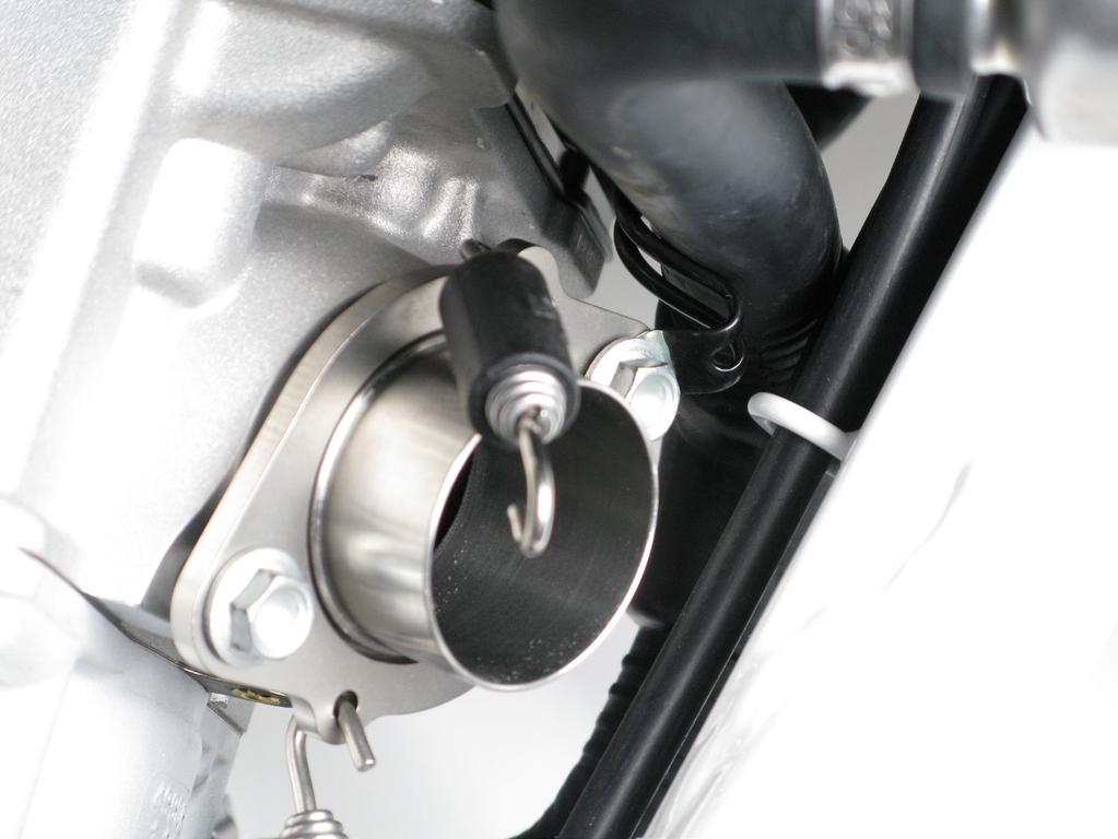 www.akrapovic.com 2. Install the assembled sleeve, flange and springs onto the motorcycle and hand tighten the two bolts.