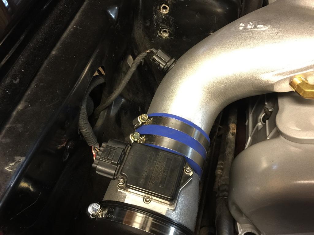 This makes them very easy to get at once installed on the car. 24. Install complete C&L intake assembly into car.