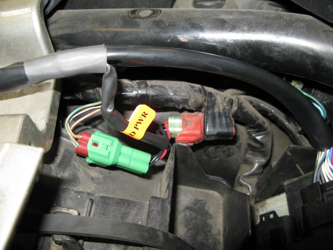 Mount the control unit in tail section, on top of the factory ECU, utilizing the factory rubber strap and using Velcro patch provided. 3. Plug the main connector form the harness to the control unit.