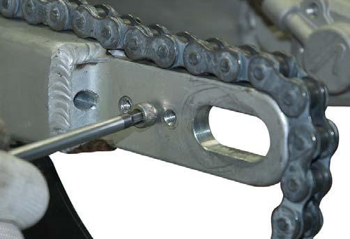 Replacement of the sprocket and drive chain. - Remove the rear wheel.