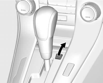 190 Driving and Operating 2. Open the cover to the right of the shift lever. 3. Insert a tool into the opening as far as it will go and move the shift lever out of P (Park) at the same time.