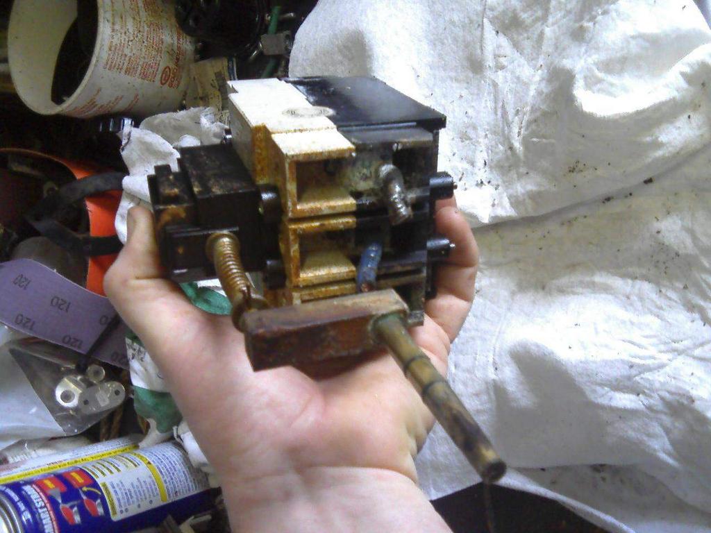 Remove the 4 screws securing breaker handle actuator unit, top plate