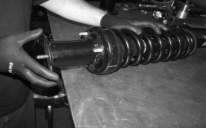 Torque crossmember bolts to 240 ft-lbs. SEE FIGURE 33 36.