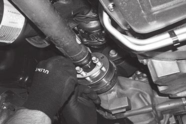 16. Locate the driver side rear lower control arm pocket.
