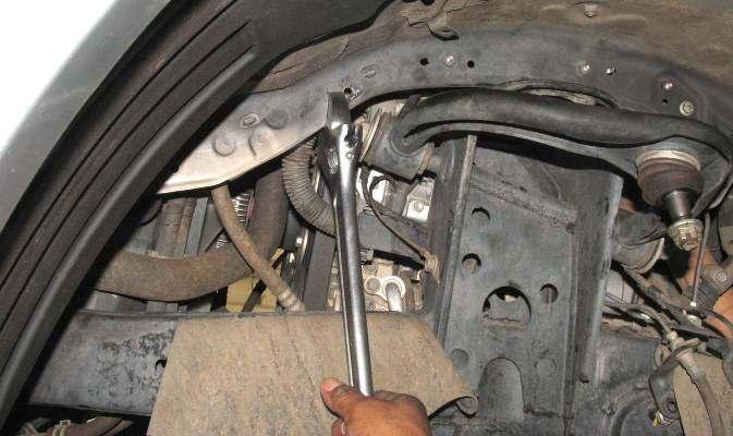 See Illustration 4 WARNING: CONTROL ARM WILL SPRING UP WITH GREAT FORCE WHEN BALL JOINT SEPARATES FROM KNUCKLE.