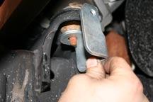 Remove the factory sway bar link. Insert the sleeve into the upper bushing. Put the flat washer on the bolt, then the bolt through the sleeve and then through the sway bar.