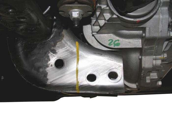 Remove the lower control arm. 16) Repeat steps 1 through 14 for the other side.