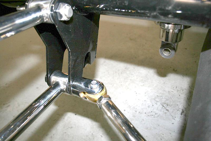 Install one rod end of the track bar onto either clevis and use it as leverage to tighten it down(125 ft lbs).