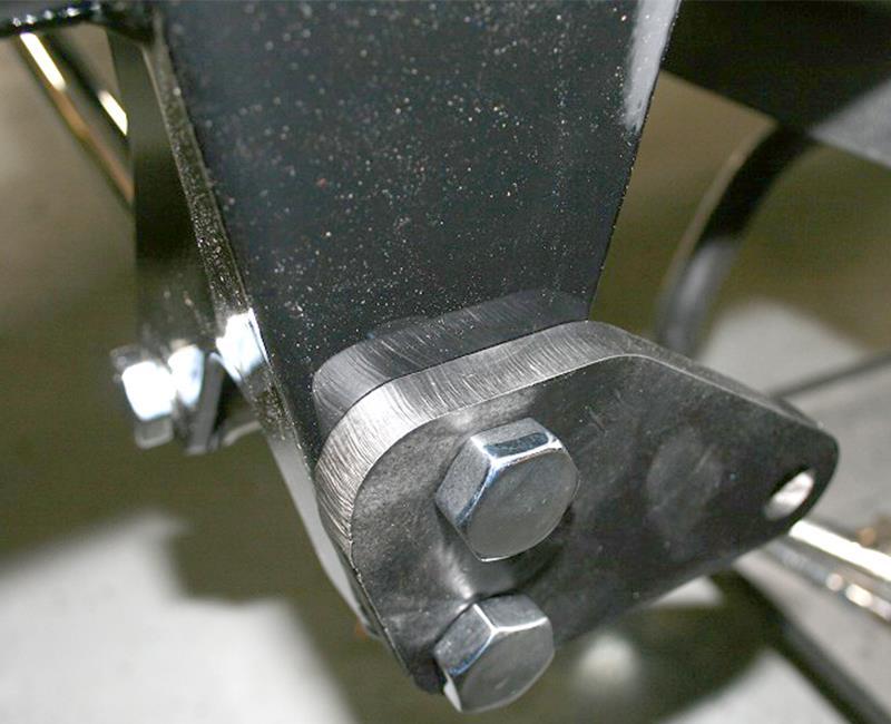 Install the offset axle brackets onto the axle brackets using the provided 5/8 hardware.