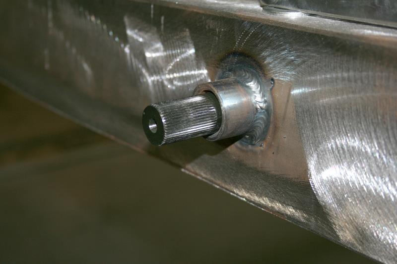 Place the splined bar into the housing. SEQUENCE OF INSTALLATION PER SIDE: 1. Nyliner 2. Washer 3.