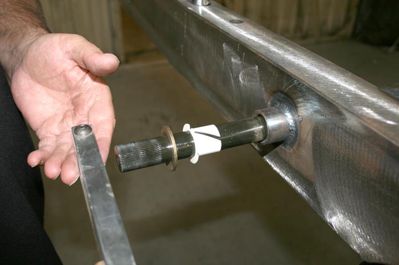 Tighten down the pinch bolts on the splined end of the bar. *NOTE* Make sure the countersunk side of the aluminum arm is facing the frame.
