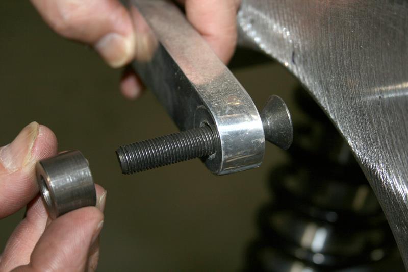 The lower 3/8 rod end connects to the upper 4-link bolt. This is where the special shoulder bolt should be installed.