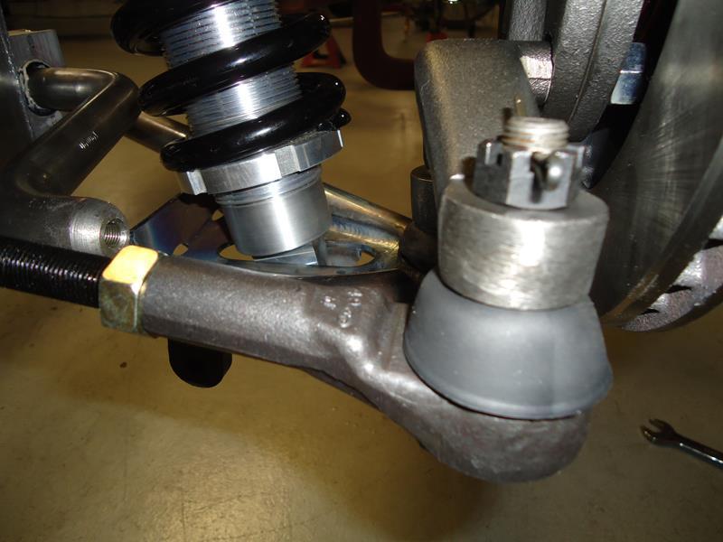 Torque bolts to 90 ft. lbs *NOTE* Power Rack & Pinion fittings: 9/16-18 Pressure side & 5/8-18 Return side Install the jam nut and outer tie rod end onto both sides of the rack.