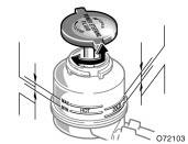 If the level is low, add SAE J1703 or FMVSS No.116 DOT 3 brake fluid to the brake reservoir. Remove and replace the reservoir cap by hand. Fill the brake fluid to the dotted line.