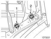 Removing clip 1: Vertical movement adjusting bolt 1 2: Vertical movement adjusting bolt 2 Before checking the headlight aim: 1.