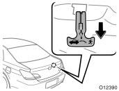 mechanical key (vehicles with smart key system) and turn it clockwise to lock the door.