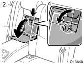 Trunk storage extension CAUTION To reduce the chance of injury in case of an accident or a sudden stop, always keep the door behind the armrest closed when not in use. 1.