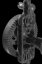 10. Look at the mechanism opposite. a) Which type of motion transmission system is used in this technical object? A gear train b) Which type of gear is used in this system? Bevel gears 11.