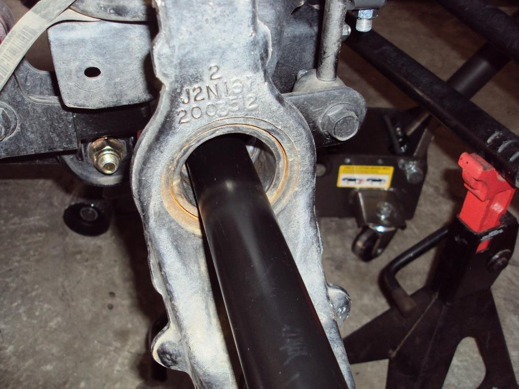 19) Clean any dirt and debris from the inside of the axle tube. A vacuum cleaner with an extension wand works well for this. 20) If installing axle tube seals proceed to Step 21.